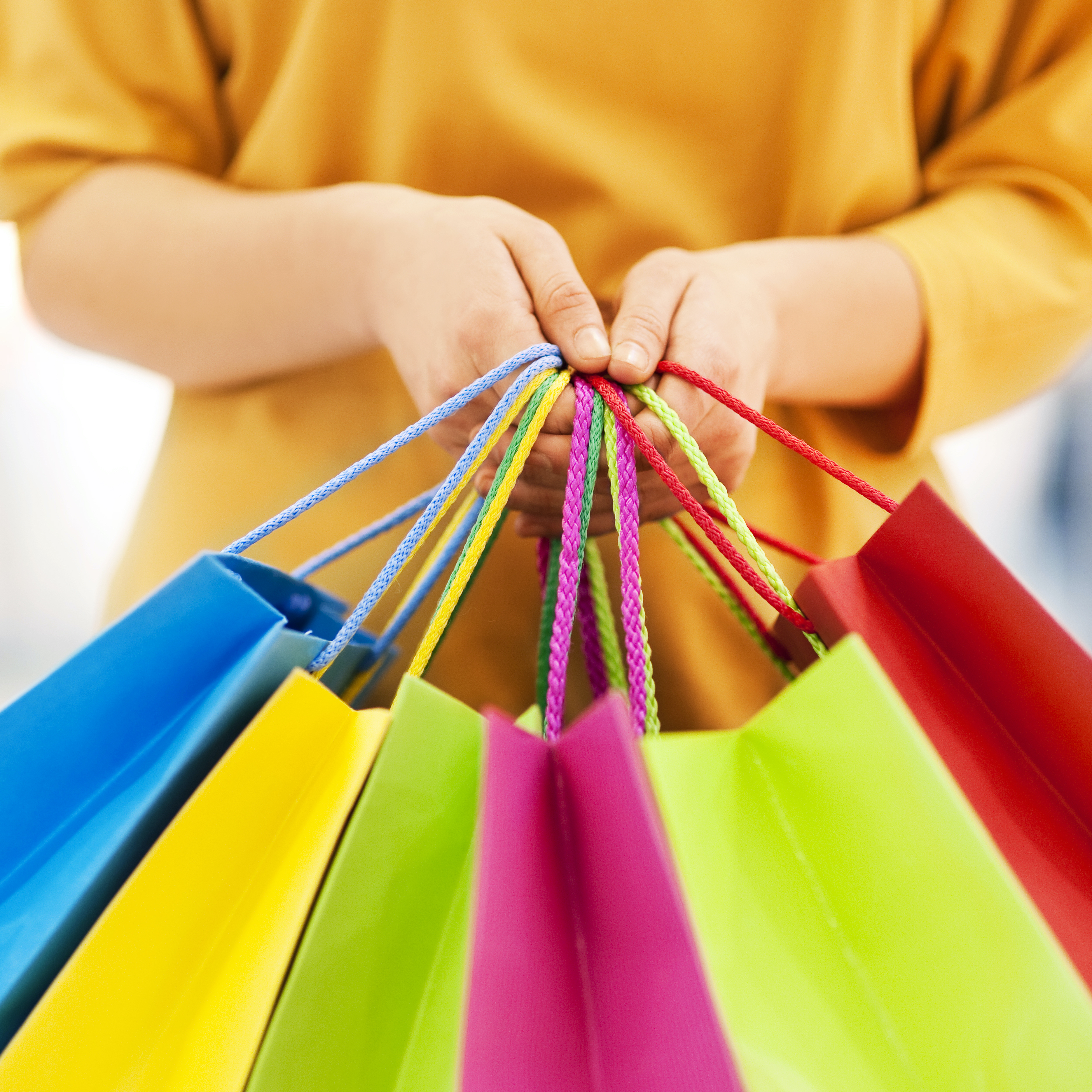 woman-holding-shopping-bags.jpg